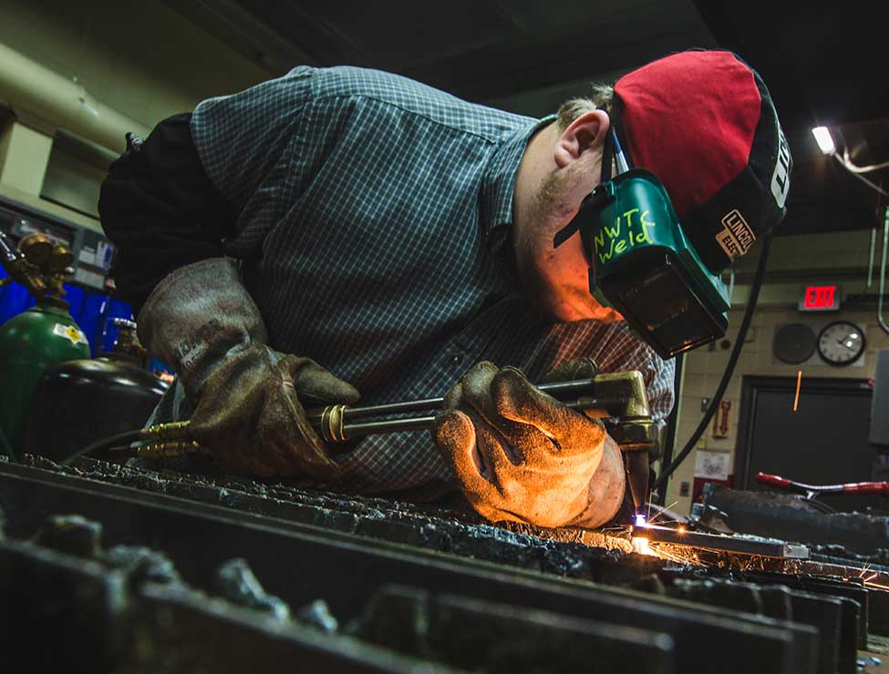 Person welding (close up)