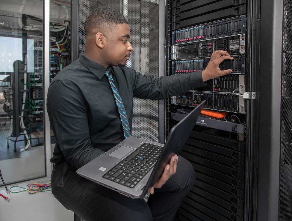 Person working on computer server