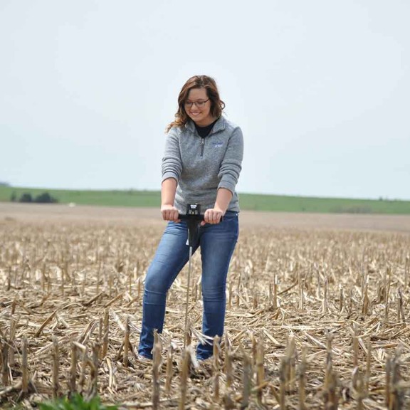 Agriculture student working in corn field