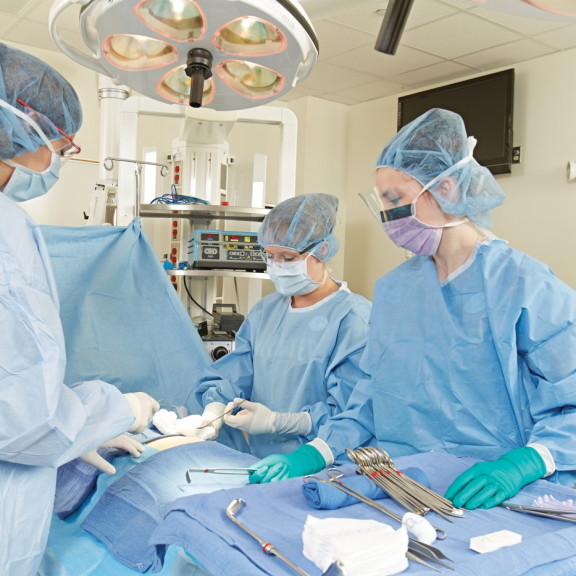 Surgical technicians in operating room