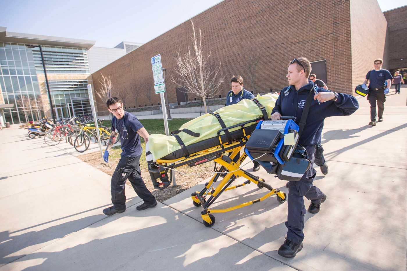 Emergency Medical Technician - Advanced transporting a patient